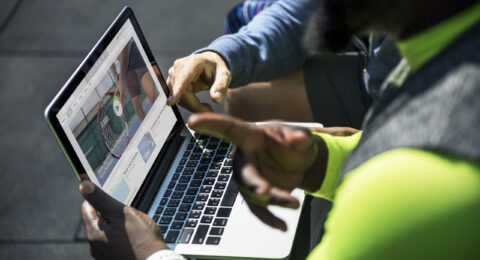 People watching tennis video clip on digital device