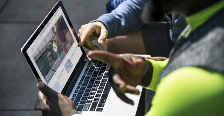 People watching tennis video clip on digital device